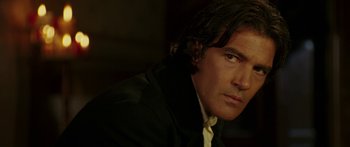 Movie still from “The Legend of Zorro” (2005), directed by Martin Campbell – A person with long hair; Close Up shot, Over the shoulder angle