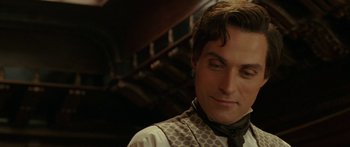 Movie still from “The Legend of Zorro” (2005), directed by Martin Campbell – A person wearing a neck tie; Close Up shot, Over the shoulder angle