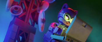 Movie still from “The Lego Batman Movie” (2017), directed by Chris McKay – A lego batman figure sitting in front of a fan; Close Up shot, Over the shoulder angle