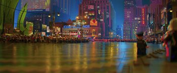 Movie still from “The Lego Batman Movie” (2017), directed by Chris McKay – A view of a city street at night with lights on buildings; Extreme Wide shot, High angle