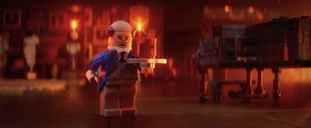 Movie still from “The Lego Batman Movie” (2017), directed by Chris McKay – A lego figure is holding a tray of food; Medium shot, Over the shoulder angle