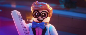 Movie still from “The Lego Batman Movie” (2017), directed by Chris McKay – A lego figure wearing a lab coat; Close Up shot, Over the shoulder angle