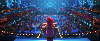 Movie still from “The Lego Batman Movie” (2017), directed by Chris McKay – A crowd of people sitting in front of a stage; Extreme Wide shot, High angle