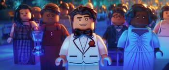 Movie still from “The Lego Batman Movie” (2017), directed by Chris McKay – A man in a suit and bow tie; Close Up shot, Over the shoulder angle