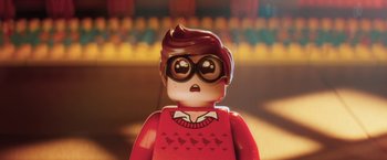 Movie still from “The Lego Batman Movie” (2017), directed by Chris McKay – A lego figure wearing glasses; Close Up shot, Over the shoulder angle