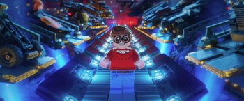 Movie still from “The Lego Batman Movie” (2017), directed by Chris McKay – A lego figure is standing on a bridge; Wide shot, Overhead angle