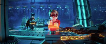 Movie still from “The Lego Batman Movie” (2017), directed by Chris McKay – The lego batman movie has a lego batman and robin figure; Medium shot, Over the shoulder angle