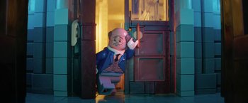 Movie still from “The Lego Batman Movie” (2017), directed by Chris McKay – A man that is standing in the door way; Medium shot, Over the shoulder angle