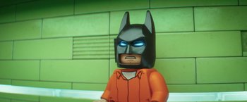 Movie still from “The Lego Batman Movie” (2017), directed by Chris McKay – A lego figure of a batman in a jail cell; Close Up shot, Low angle