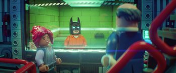 Movie still from “The Lego Batman Movie” (2017), directed by Chris McKay – A lego batman in an orange jail cell; Close Up shot, Over the shoulder angle