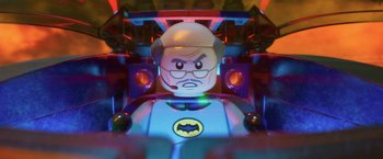 Movie still from “The Lego Batman Movie” (2017), directed by Chris McKay – A lego batman character; Close Up shot, Over the shoulder angle