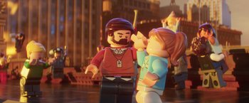 Movie still from “The Lego Batman Movie” (2017), directed by Chris McKay – Two lego figures standing next to each other on a city street; Close Up shot, Over the shoulder angle