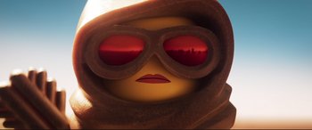 Movie still from “The Lego Movie 2: The Second Part” (2019), directed by Mike Mitchell – A lego head wearing sunglasses; Extreme Close Up shot, Low angle
