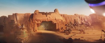 Movie still from “The Lego Movie 2: The Second Part” (2019), directed by Mike Mitchell – An image of an animated movie scene with a bat cave; Extreme Wide shot, High angle