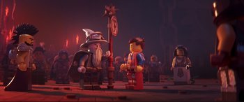 Movie still from “The Lego Movie 2: The Second Part” (2019), directed by Mike Mitchell – A scene from the lego movie with lego figures; Wide shot, Over the shoulder angle