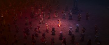 Movie still from “The Lego Movie 2: The Second Part” (2019), directed by Mike Mitchell – A crowd of people sitting on the ground; Extreme Wide shot, High angle