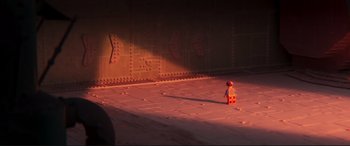 Movie still from “The Lego Movie 2: The Second Part” (2019), directed by Mike Mitchell – A lego figure standing in the middle of an area; Extreme Wide shot, High angle