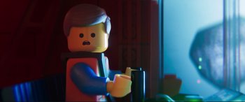 Movie still from “The Lego Movie 2: The Second Part” (2019), directed by Mike Mitchell – A lego man sitting at a table; Close Up shot, Over the shoulder angle