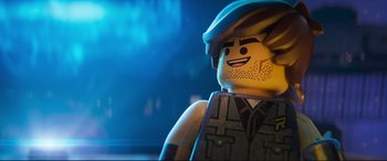 Movie still from “The Lego Movie 2: The Second Part” (2019), directed by Mike Mitchell – A close up picture of a lego man; Close Up shot, Over the shoulder angle