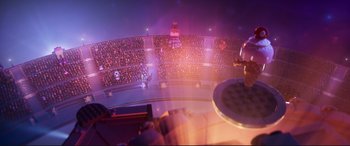 Movie still from “The Lego Movie 2: The Second Part” (2019), directed by Mike Mitchell – An aerial view of an indoor arena with people sitting in the seats; Extreme Wide shot, High angle