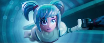 Movie still from “The Lego Movie 2: The Second Part” (2019), directed by Mike Mitchell – A toy doll with blue hair; Close Up shot, Low angle
