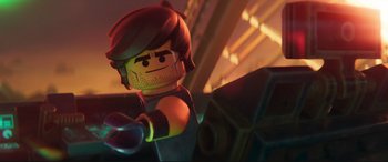 Movie still from “The Lego Movie 2: The Second Part” (2019), directed by Mike Mitchell – A lego character with a helmet on; Close Up shot, Over the shoulder angle
