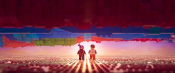 Movie still from “The Lego Movie 2: The Second Part” (2019), directed by Mike Mitchell – A couple of lego people standing next to each other; Extreme Wide shot, Overhead angle