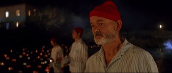 Movie still from “The Life Aquatic with Steve Zissou” (2004), directed by Wes Anderson – A group of men standing next to each other; Close Up shot, Low angle
