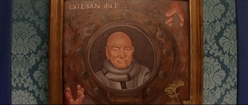 Movie still from “The Life Aquatic with Steve Zissou” (2004), directed by Wes Anderson – A painting of an older man in a jacket; Extreme Close Up shot, Overhead angle
