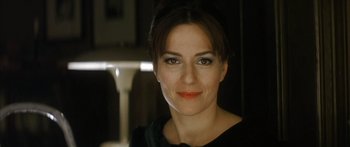 Movie still from “The Lives of Others” (2006), directed by Florian Henckel von Donnersmarck – A person wearing a black shirt; Close Up shot, Over the shoulder angle