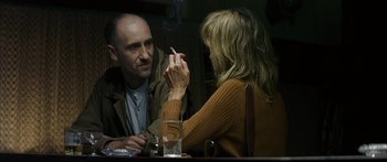 Movie still from “The Lives of Others” (2006), directed by Florian Henckel von Donnersmarck – A man and a woman sitting at a dinner table; Close Up shot, Over the shoulder angle