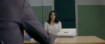 Movie still from “The Lives of Others” (2006), directed by Florian Henckel von Donnersmarck – A woman sitting in front of a mirror in a room; Medium shot, Over the shoulder angle