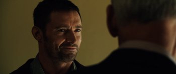 Movie still from “Real Steel” (2011), directed by Shawn Levy – A person looking at another person; Close Up shot, Over the shoulder angle