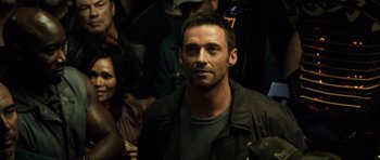 Movie still from “Real Steel” (2011), directed by Shawn Levy – A person with a crowd of people; Close Up shot, Over the shoulder angle