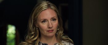 Movie still from “Real Steel” (2011), directed by Shawn Levy – A person with long blonde hair; Close Up shot, Over the shoulder angle