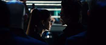 Movie still from “Real Steel” (2011), directed by Shawn Levy – A man and a woman face to face in the dark; Close Up shot, Over the shoulder angle