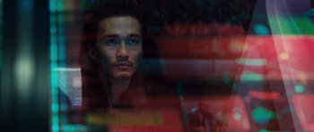 Movie still from “Real Steel” (2011), directed by Shawn Levy – A man looking out of a window at night time; Close Up shot, Low angle