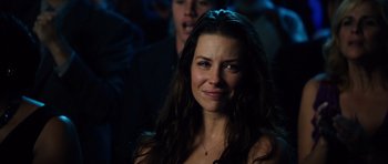 Movie still from “Real Steel” (2011), directed by Shawn Levy – A beautiful woman with long dark brown hair; Close Up shot, Over the shoulder angle