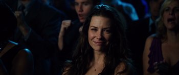 Movie still from “Real Steel” (2011), directed by Shawn Levy – A beautiful woman with long dark brown hair; Close Up shot, Over the shoulder angle