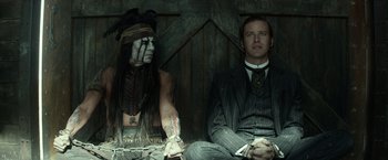 Movie still from “The Lone Ranger” (2013), directed by Gore Verbinski – Johnny depp and armie hammer in the lone ranger; Medium shot, Over the shoulder angle