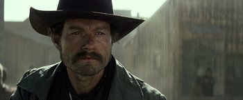 Movie still from “The Lone Ranger” (2013), directed by Gore Verbinski – A person wearing a hat; Close Up shot, Low angle