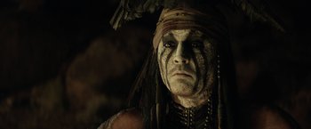 Movie still from “The Lone Ranger” (2013), directed by Gore Verbinski – A person with a face paint; Close Up shot, Low angle