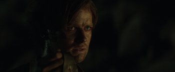 Movie still from “The Lone Ranger” (2013), directed by Gore Verbinski – A person with a knife in his hand; Close Up shot, Over the shoulder angle