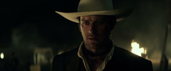 Movie still from “The Lone Ranger” (2013), directed by Gore Verbinski – A person wearing a cowboy hat; Close Up shot, Over the shoulder angle