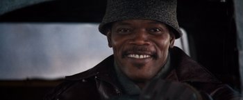 Movie still from “The Long Kiss Goodnight” (1996), directed by Renny Harlin – A person wearing a hat; Close Up shot, Low angle