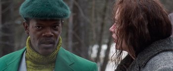Movie still from “The Long Kiss Goodnight” (1996), directed by Renny Harlin – A man in a green jacket and a woman in a green jacket; Close Up shot, Over the shoulder angle