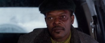 Movie still from “The Long Kiss Goodnight” (1996), directed by Renny Harlin – A person wearing a hat; Close Up shot, Low angle
