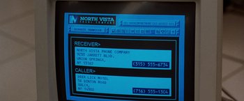 Movie still from “The Long Kiss Goodnight” (1996), directed by Renny Harlin – A computer screen showing a receiver and caller numbers; Extreme Close Up shot, High angle
