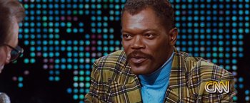 Movie still from “The Long Kiss Goodnight” (1996), directed by Renny Harlin – A person wearing a jacket; Close Up shot, Over the shoulder angle