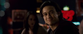 Movie still from “The Lookout” (2007), directed by Scott Frank – A person with a smile on his face; Close Up shot, Over the shoulder angle